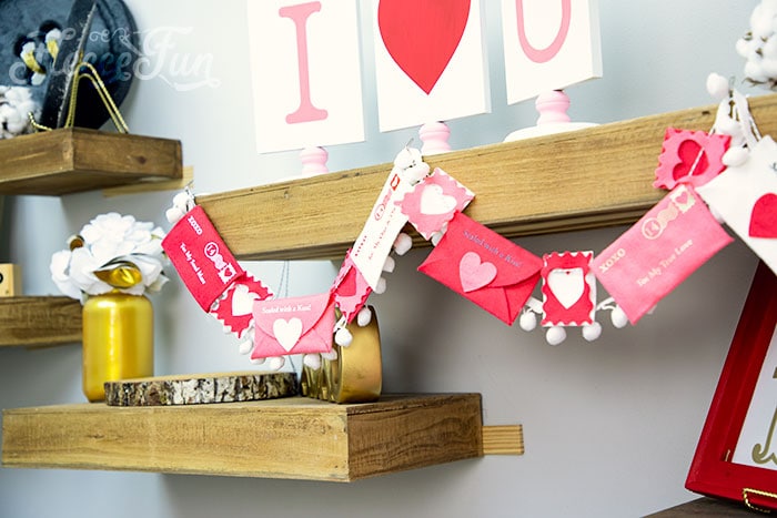 making garlands out of the felt valentine envelope