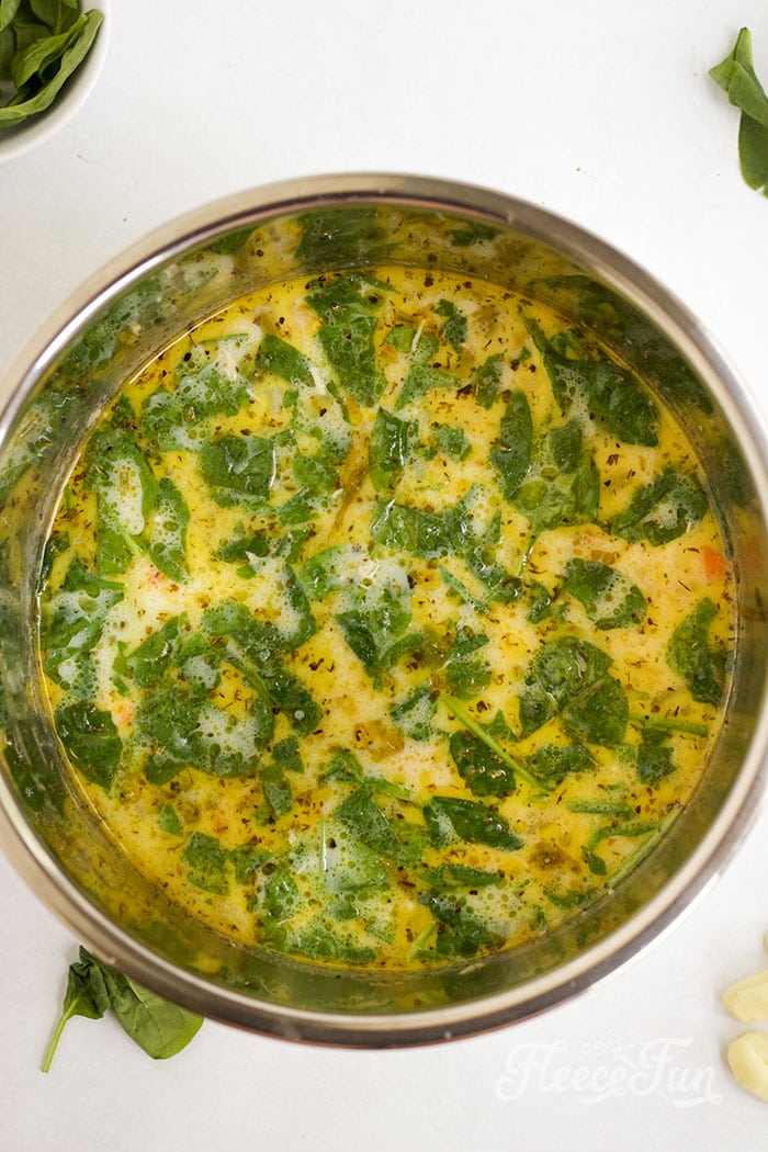 Adding then chicken and final ingredients.