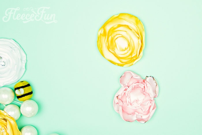 You can make these easy DIY Fabric Flowers, Free template and video tutorial makes it fun and simple. Step by step instructions. the flowers stacked.