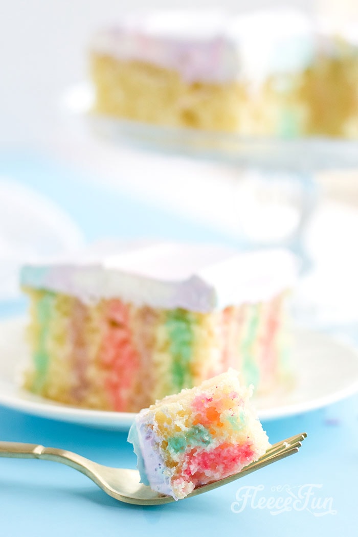 This Super Easy Unicorn Poke Cake Recipe is perfect for a fast fun ( but impressive looking ) treat! Easy to follow instructions make this cake a party winner.