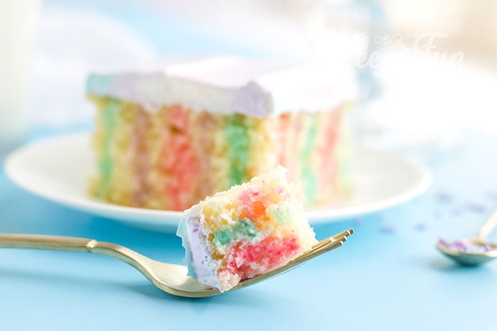 This Super Easy Unicorn Poke Cake Recipe is perfect for a fast fun ( but impressive looking ) treat! Easy to follow instructions make this cake a party winner.