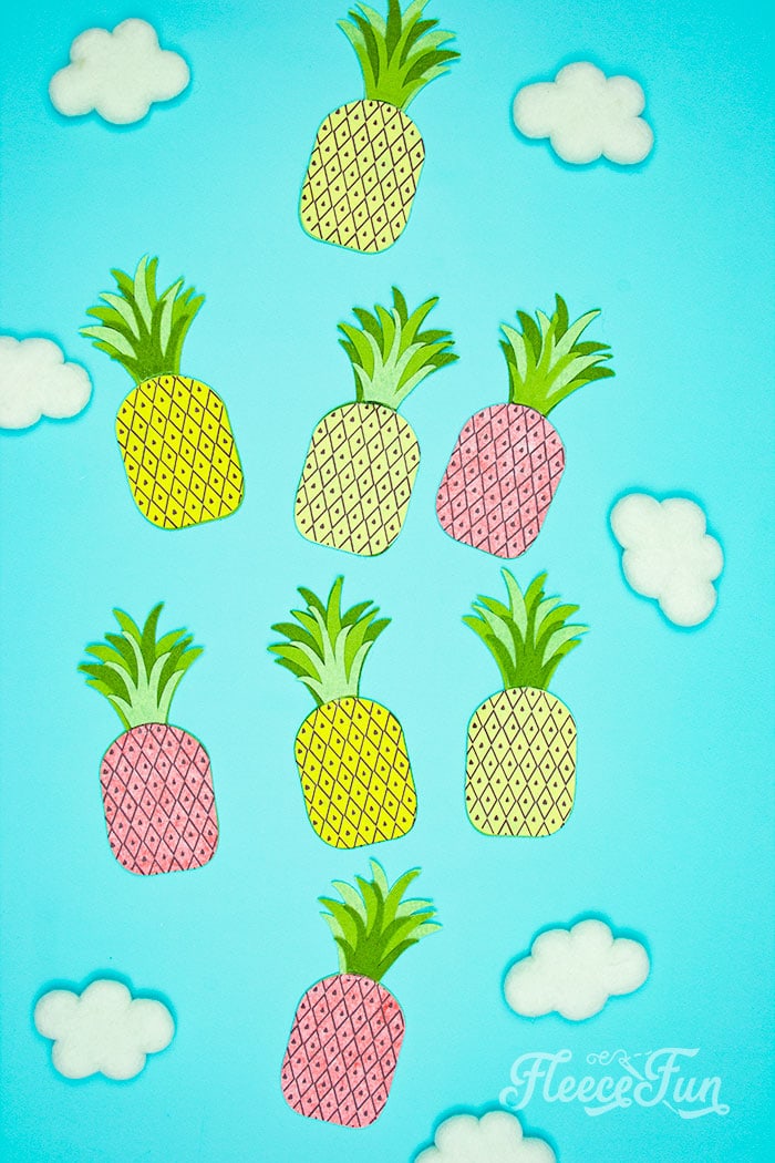 This DIY Pineapple décor is easy to make and has many possibilities! Use the free files to make anything from a cute shirt using HTV to a pillow using fabric.  There is something magical about pineapples.  They brings feeling of warmth, vacation and fun!