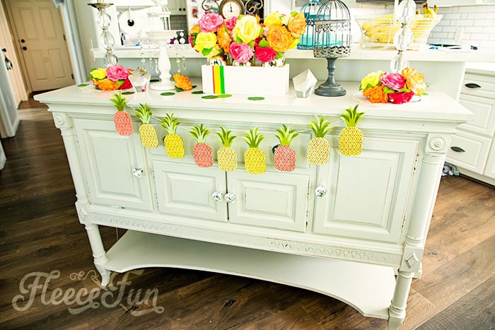 This DIY Pineapple décor is easy to make and has many possibilities! Use the free files to make anything from a cute shirt using HTV to a pillow using fabric.  There is something magical about pineapples.  They brings feeling of warmth, vacation and fun!