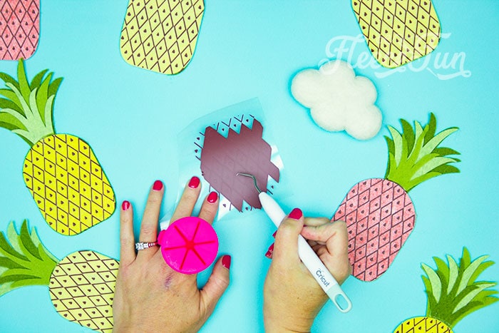 weeding HTV This DIY Pineapple décor is easy to make and has many possibilities! Use the free files to make anything from a cute shirt using HTV to a pillow using fabric.  There is something magical about pineapples.  They brings feeling of warmth, vacation and fun!