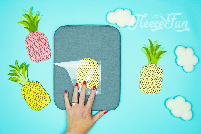 ironing on the htv. This DIY Pineapple décor is easy to make and has many possibilities! Use the free files to make anything from a cute shirt using HTV to a pillow using fabric.  There is something magical about pineapples.  They brings feeling of warmth, vacation and fun!