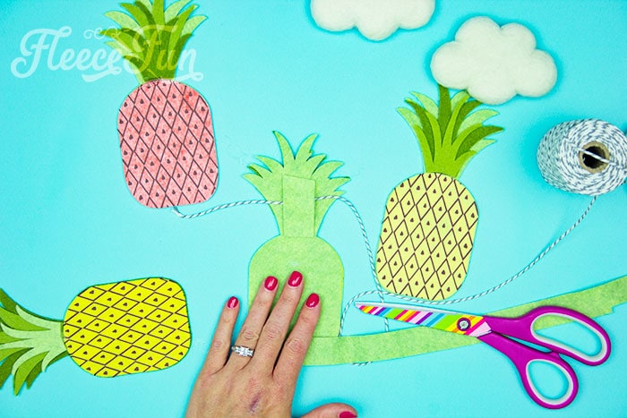 adding fabric so it can hang. This DIY Pineapple décor is easy to make and has many possibilities! Use the free files to make anything from a cute shirt using HTV to a pillow using fabric.  There is something magical about pineapples.  They brings feeling of warmth, vacation and fun!