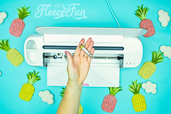 switching to rotary blade. This DIY Pineapple décor is easy to make and has many possibilities! Use the free files to make anything from a cute shirt using HTV to a pillow using fabric.  There is something magical about pineapples.  They brings feeling of warmth, vacation and fun!