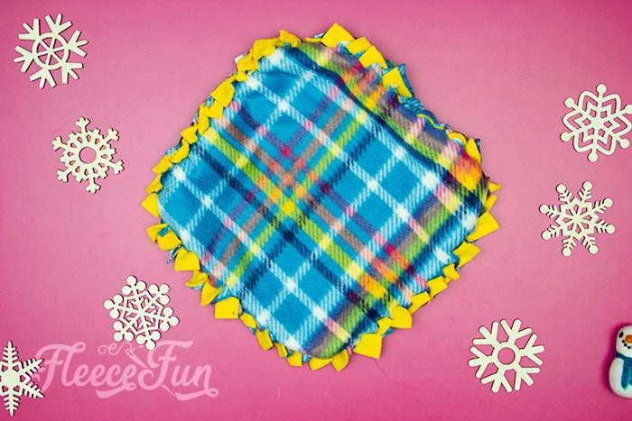 Learn how to make a No Sew Fleece Tie Blanket 3 different ways. Never before seen techniques and FREE templates to make it fast and easy.