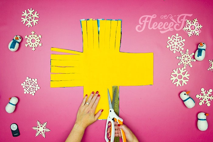 using a ruller to cut the fringe. Learn how to make a No Sew Fleece Tie Blanket 3 different ways. Never before seen techniques and FREE templates to make it fast and easy.