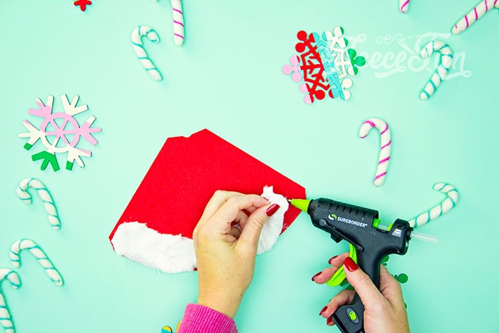Forming the cone shape for the Santa hat using fleecefun's free template