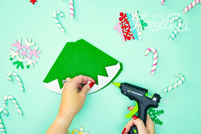 Assembling the cone section of the mini Santa hat with fleecefun's tutorial