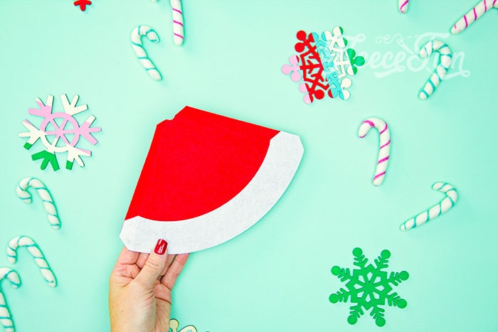 Creating the DIY Santa hat cone with fleecefun’s free pattern and instructions