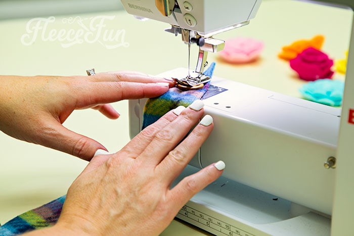 Fleecefun's guide to adding buttonholes and buttons to a fleece ear warmer headband.