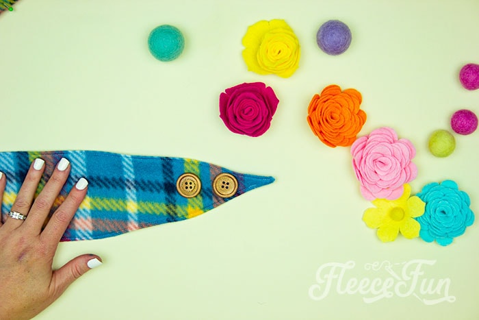 Fleecefun's guide to adding buttonholes and buttons to a fleece ear warmer headband.