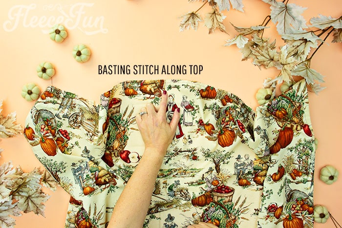 basting stitch along top of apron skirt. This Free apron pattern and tutorial includes a pdf pattern and video! Make a vintage style apron that is chic.