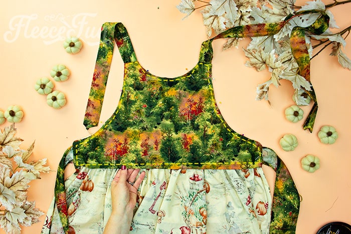Pin the bottom of the bodice lining into place so it won't shift under the needle.