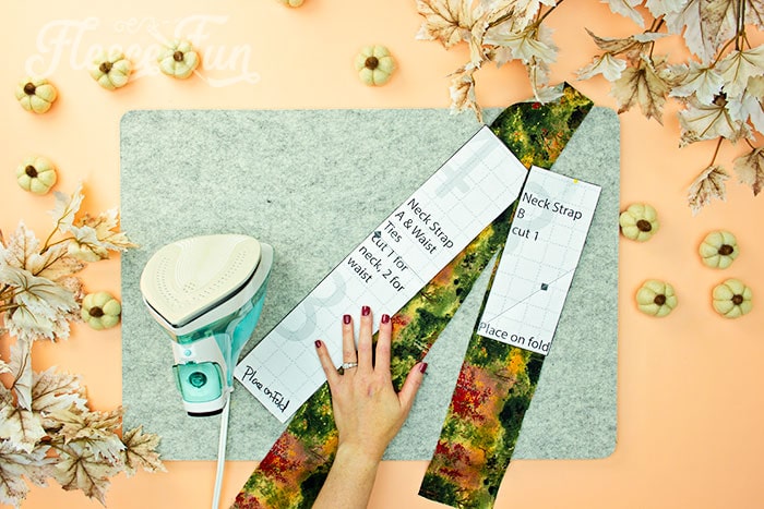 Iron and prep the apron pieces using FleeceFun's free Thanksgiving apron pattern template and tutorial