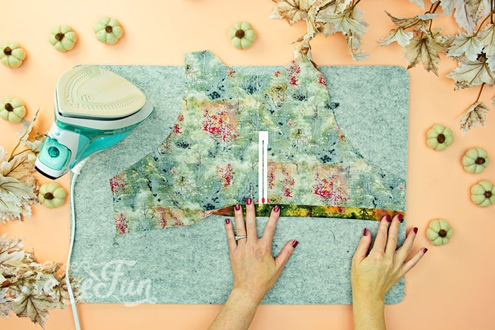 Bottom of bofice lining utrned up and pressed. This Free apron pattern and tutorial includes a pdf pattern and video! Make a vintage style apron that is chic.