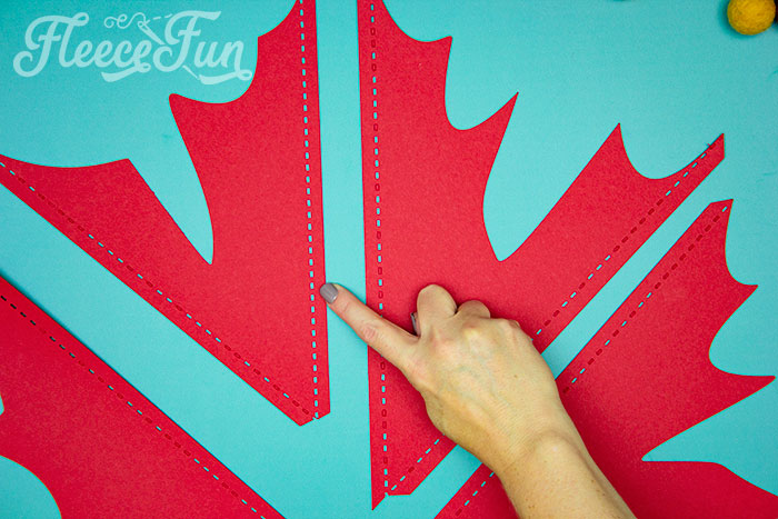 pointing to the dahsed score line. This Giant Maple Leaf Template and Tutorial (Free PDF and SVG) is larger than life. This step by step tutorial shows how to bring fall foliage indoors.