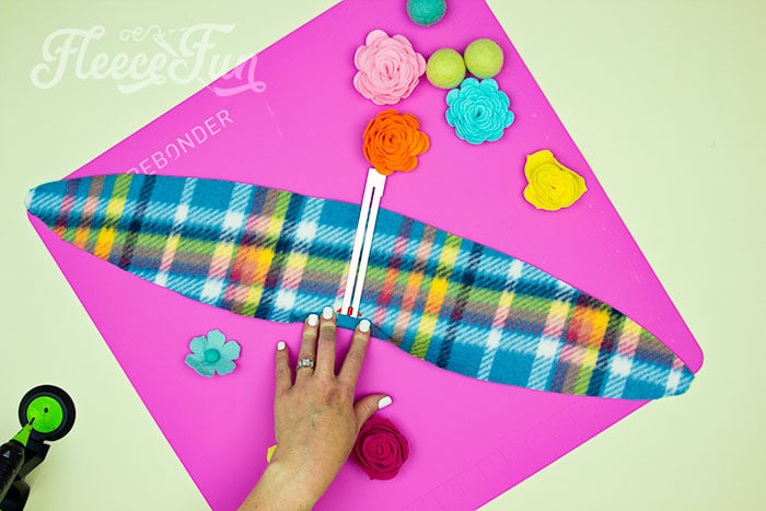 No sew fleece ear warmer: Fleecefun tutorial showing how to sew a fleece headband ear warmer with a free pattern.