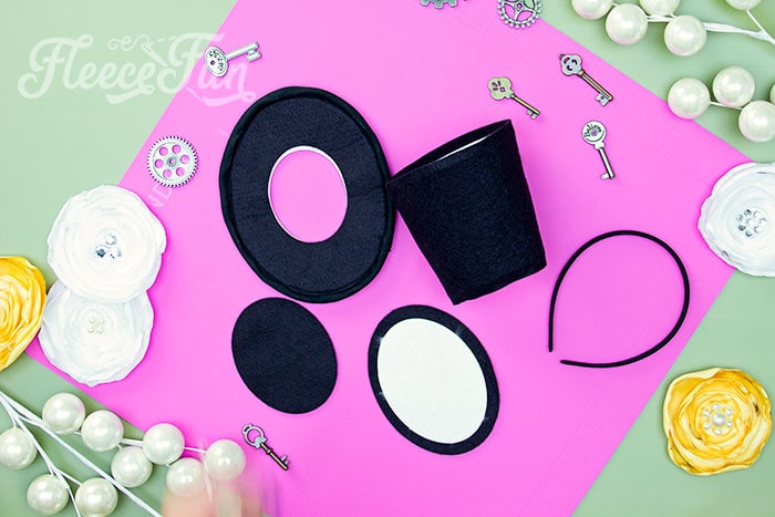 All the pieces to the mini top hat. Learn how to make a mini top hat with this free pattern and tutorial. I love that there is a sew and no sew option. The free template makes this costume idea easy to make at home. 