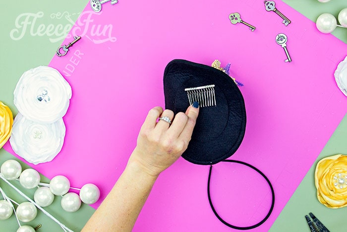Close-up of the final touches on the mini top hat decoration from fleecefun's tutorial