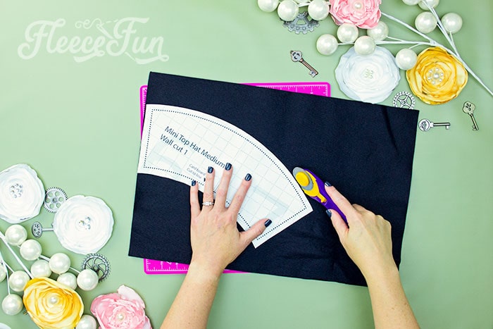 Step-by-step image showing the cutting process for the mini top hat pattern from fleecefun
