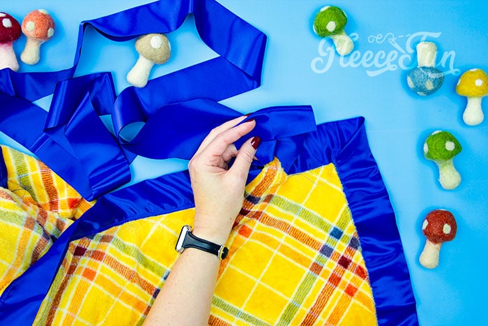 Completing the satin-bound fleece blanket project, following fleecefun’s free instructions