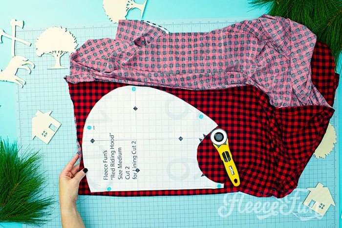 showing how the hood lining should be cut out of the cloth.