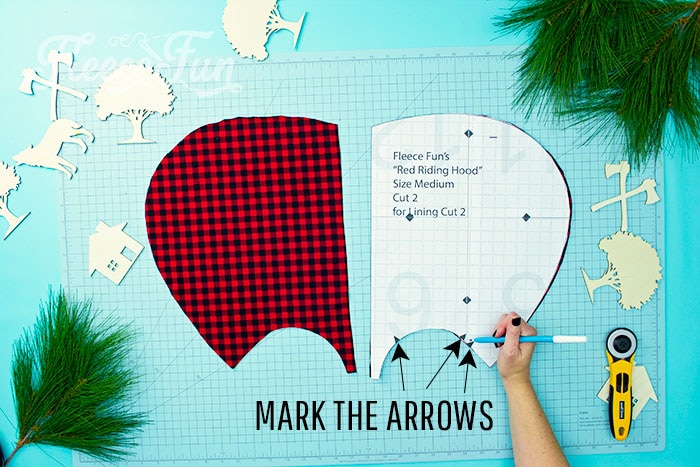 Where to maker the arrows to ine up the hood with the cape.