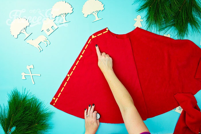 showing how the side seam should be sewn on the red riding hood cape pattern.