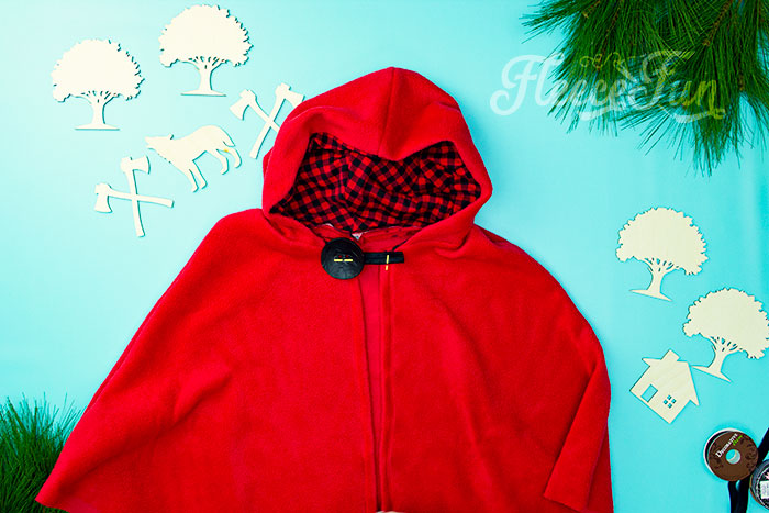how to sew on the button to the cape