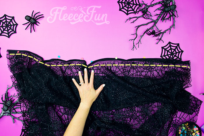 Learn How to Make a Cloak in 20 Minutes (Easy)! This Halloween cape DIY is easy to sew and is a great compliment to costumes. Made from lighter material this easy DIY cloak is made to compliment costumes, without covering them up completely. Because this tutorial requires no pattern - you can easily adjust it for the length and look you want. It can be a long cloak or a short capelet - you decide! If you use the recommended fabric this cape sews up quickly