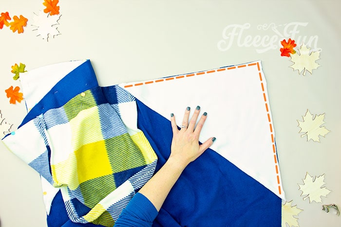 FleeceFun step-by-step: Attaching the hood and handwarmers to the blanket.