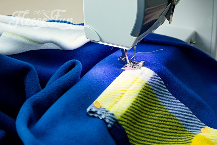 finish off the edges of the blanket.