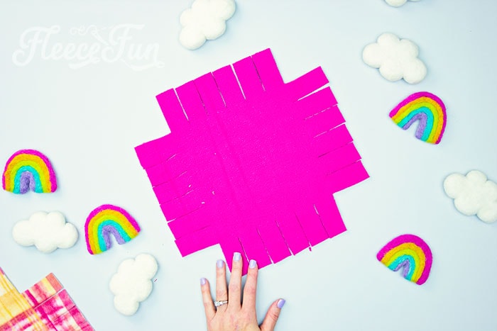 Prepare patchwork tie blanket squares with fleecefun free template.