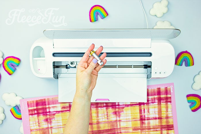 Step-by-step guide to cutting fleece squares for a patchwork tie blanket with fleecefun template.