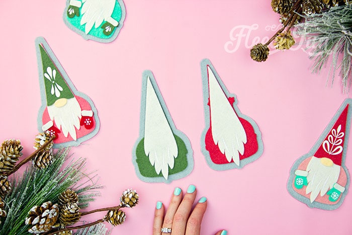 Assemble your DIY gnome ornament by gluing the pieces using fleecefun’s guide.
