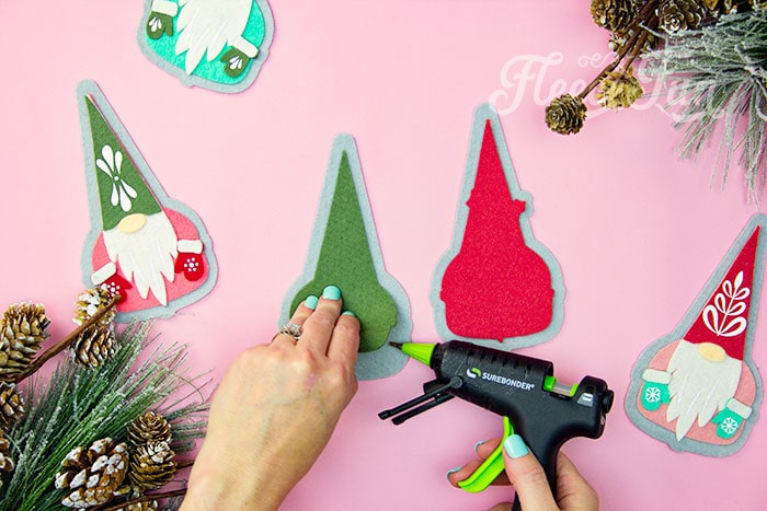 Glue the DIY gnome ornament pieces together with fleecefun's free template and tutorial.