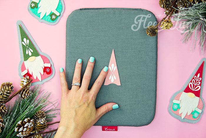 Personalize your felt gnome ornament by adding HTV with fleecefun’s tutorial.
