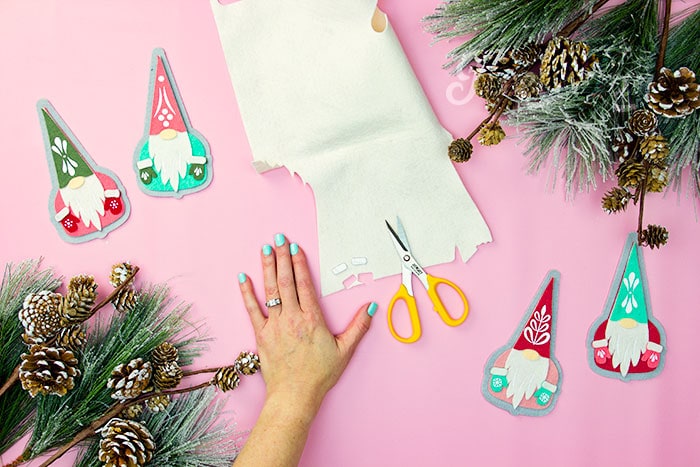 Cut the felt pieces for your gnome ornament using fleecefun's free pattern.