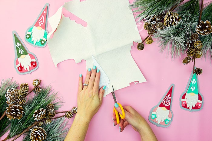 Cut out the DIY gnome ornament pieces using fleecefun's free pattern and tutorial.