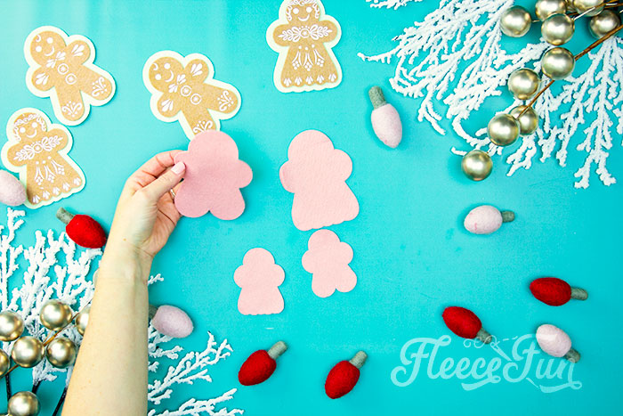 Felt Gingerbread Girl pieces prepared using fleecefun free template for crafting.