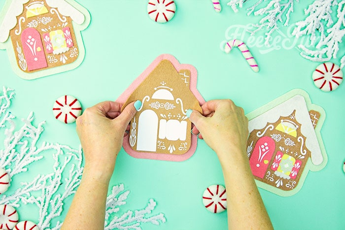 Assembling the felt gingerbread house ornament using fleecefun’s free template and tutorial