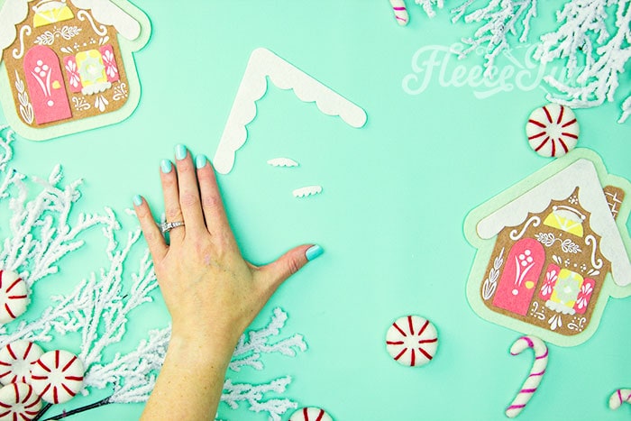 Felt pieces for the gingerbread house ornament cut from fleecefun’s free pattern and tutorial
