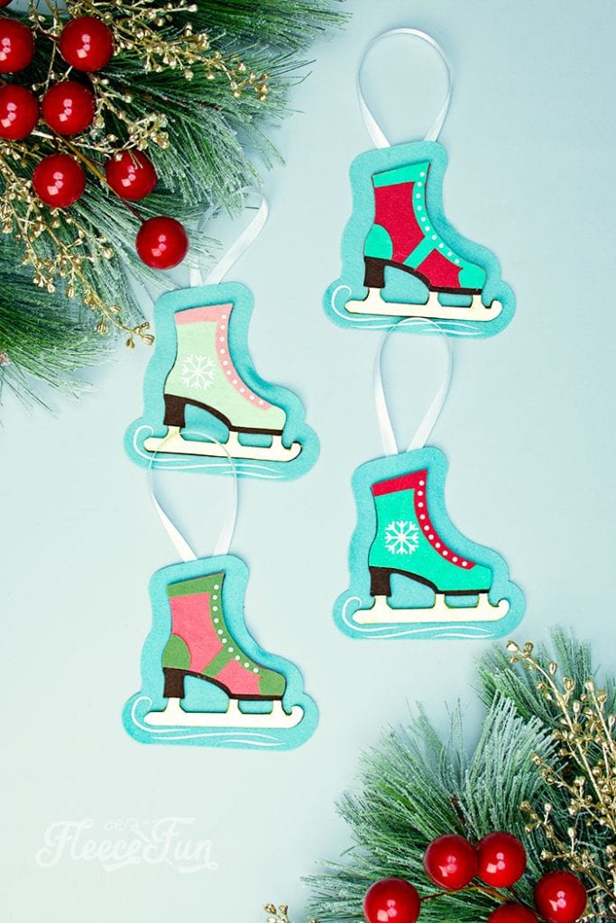 You can make this homemade Ice Skate ornament DIY (free pattern).  With a few materials, this no sew felt ornament can be a wonderful addition to your Christmas tree.  It also makes a lovely handmade gift for a loved one.  This free templates comes with two versions of the skate: one spats shoe style and one with a snowflake on the side.  You can also modify the pattern and eliminate the blue background if you wish.