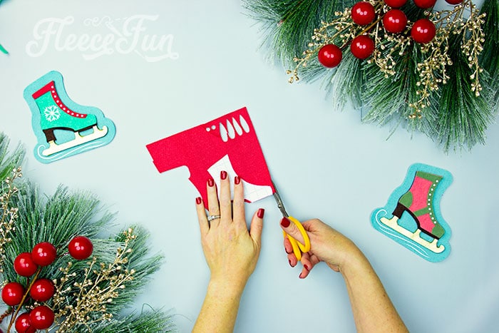 Cutting out the free ice skate ornament template from fleecefun's tutorial
