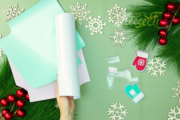 Tracing and cutting the free mitten ornament template from fleecefun.