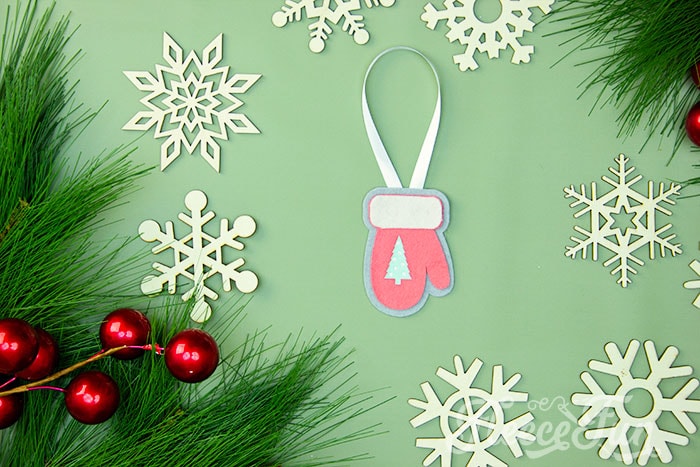 adding ribbon to the ornament