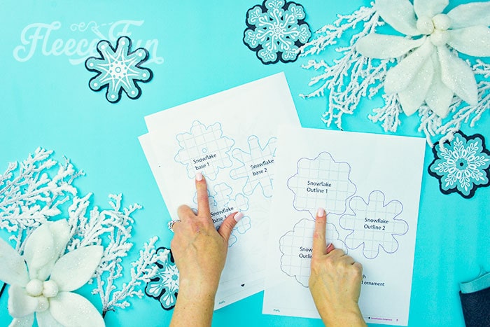 Cutting out the free snowflake ornament template from fleecefun tutorial